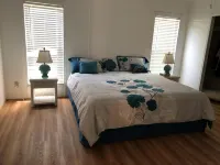 Waterfront, indoor pool, covered marina, fenced 3/2 home