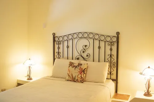 Private suite 103 with beautiful gardens, shared pool and BBQ area!