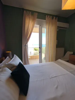 Classy 1-bedroom condo; WiFi, AC, home-office, playroom, sea view at Salamina Hotels near Salamis Island