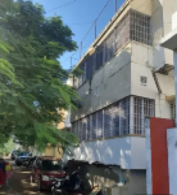 Convenient shared room in a 2bhk with all amenities at value in central Chennai.