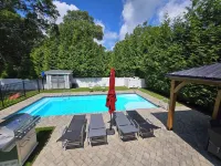 Tranquility Near the Sea with in-ground salt water pool and fenced in yard.