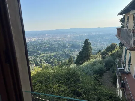 Suite Panorama Fiesole la Miglior Vista su Firenze Отели рядом с достопримечательностью «Монастырь Сан-Доменико»