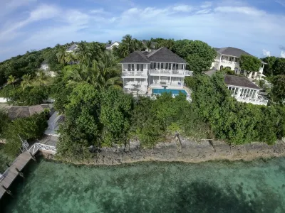 Serene waterfront house w pool, dock & beautiful sunsets - 5 min walk to beach. Hotels in 