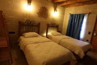 Atax Cave House