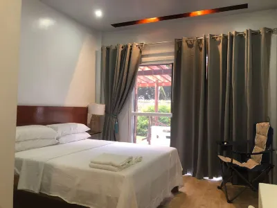 Melbas Homestyle Resort & Spa Hotels near Mainit Chapel