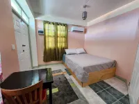 C & M Suites Your Haven in the City Hotels near Dominica Sculpture Sign - Photo Spot