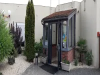 Le Petit Logis Hôtels à : Beaumont-en-Véron