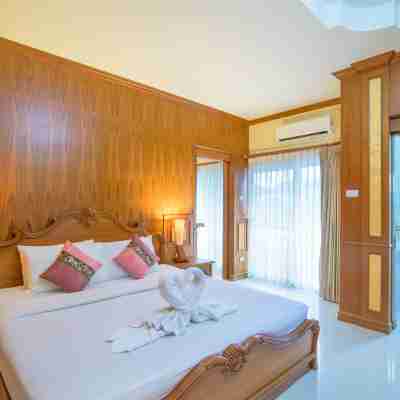 Hua Hin Condotel & Resort by Taweeporn Rooms