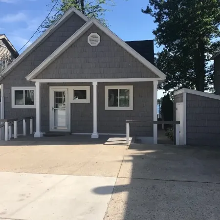 Experience Lake Life at Our 3-Bedroom Beachfront Cottage, Near Grand Rapids.
