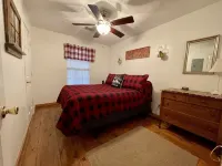 Downtown by Chattahoochee River, sit on front porch as horse and buggy stroll by