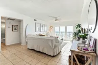 The Pink Pearl - Top Floor Beachfront Boho Condo with Community Pool!