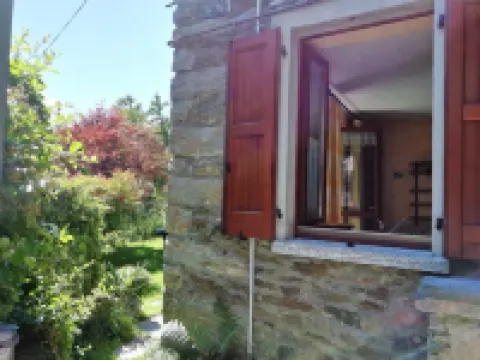 Apartment in an old barn, private garden overlooking the village