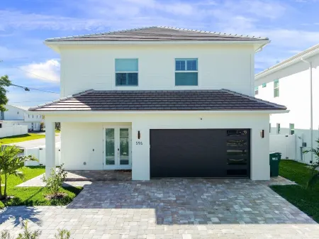 New Listing! Luxury Beach Home with 2 Master Suites!