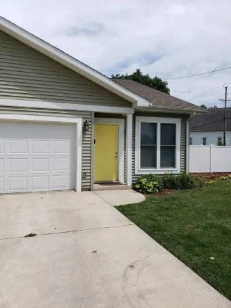 Newer 2 bedroom 1 bath with attached garage and free washer/dryer in a great loc