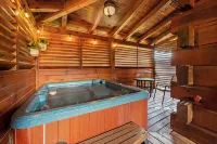 Prime location! Two king suites, hot tub and rock wall!