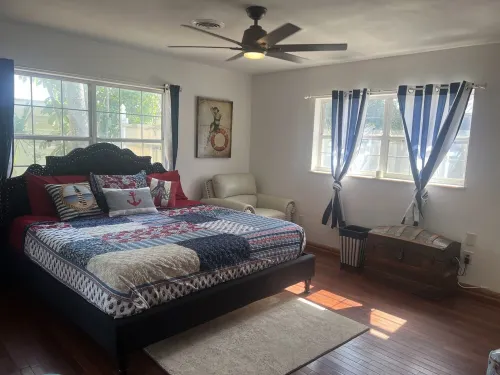 Home with play room, enclosed pool and hot tub. Only 10 minutes from the beach!