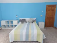 Enjoy our spacious 4 bedroom house with a private pool in a quiet area.