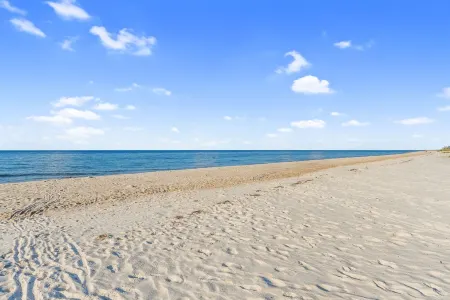 Beautiful St.George Island Pool Home, Large Patio Pool Surround & Fire Pit Area.