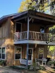 Adorable 2 story lake front setting.
