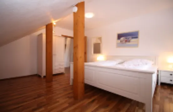 Vacation apartment "Leuchtturm" with large garden in the heart of Pilsum