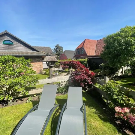 Quietly located vacation apartment with garden Отели в г. Борн-на-Дарсе