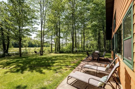 Secluded 4-season cabin w/private waterfront, epic game room & mins from trails