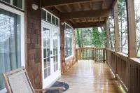 private hot tub, fun game room, cozy beach house