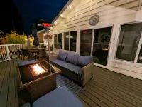 Waterfront Villa with Private Beach, Hot tub, EV & WFH