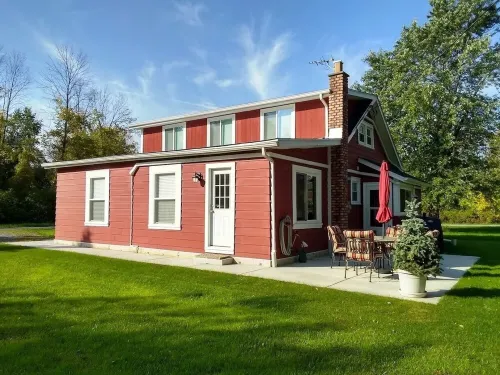 “The Red House”  Family Friendly Vacation Home Close to Beach and Lake Access.