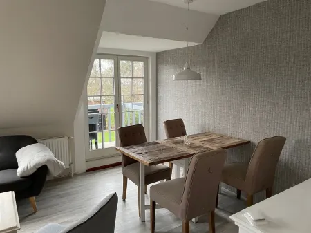 Cozy apartment under the roof with two bedrooms Отели в г. Санкт-Петер-Ординг