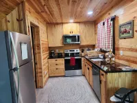 The Harmony Cabin A cozy one bedroom cabin!