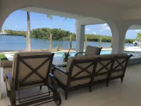 Coconut Sunsets Open Water Views, Ice, Pool, Spa 100 ft dockage, Putting Green