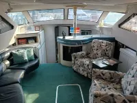 A VERY NICE 43'  YACHT WITH LONG RIVER VIEWS AND ONSITE RIVERSIDE DINING