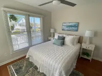 FULLY RENOVATED: pool, walk to beach, water views!