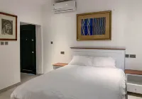 Cony’s Guest House Hotels near Container