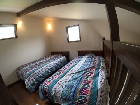 Uminchu Style Amami <Amamioshima> Отели рядом с достопримечательностью «Banyan Tree»