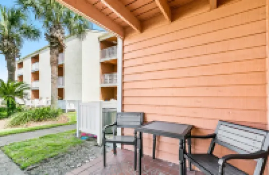 Pool view condo with free WiFi, central ac, private w/d, & shared pool