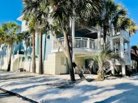 Community Pool and Distinct Living Spaces - Elegant Beach House Retreat