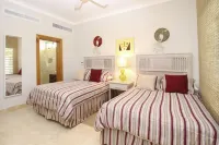 Fully Equipped Apartment Overlooking Golf Course at Luxury Beach Resort Hotels in 