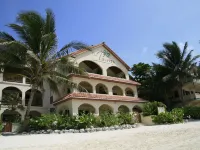 The Palms Oceanfront Suites Hotels near John Greif II Airport