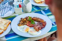 On the Beach Guesthouse Jeffreys Bay - พร้อมอาหารเช้า