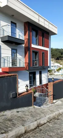 Saatlı Hotel Отели в г. Чешме