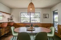 Rockstar waterfront lake house! Mid century modern with large 2 story party deck