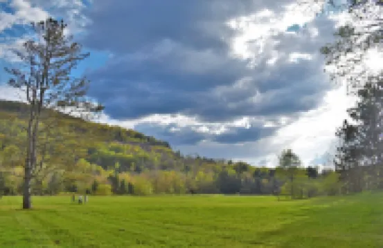 Creek house with expansive mountain views