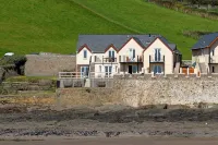 Out Of The Blue Is Situated In A Breathtaking Location Overlooking Croyde Beach. Hotels near Surfer's Paradise Croyde Bay Campsite