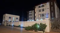 SAN MAMES Hoteles en Akim Oda