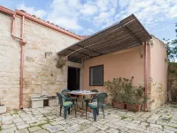 Near the sea, in a typical farmhouse surrounded by orange trees with pool, BBQ.