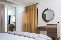 Appartement de Haut Standing Climatisé Proche de Toute Commodité Hôtels à : 