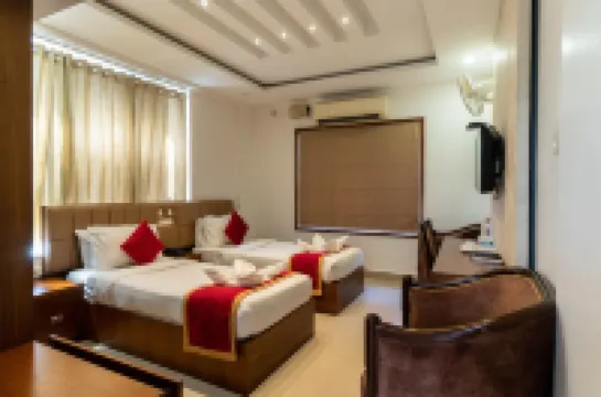 Royal Plaza Glitz Inn コーリコードのホテル