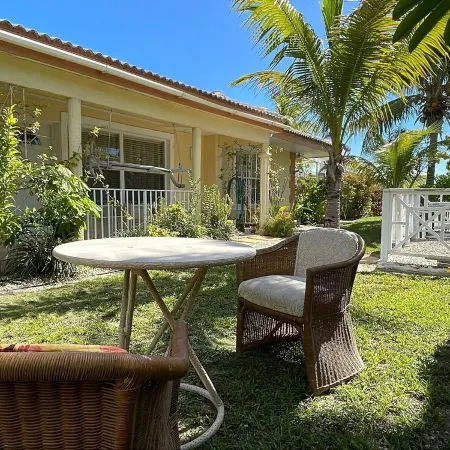 2Br near Coral Beach- Coconut Villa, hear the waves and relax!